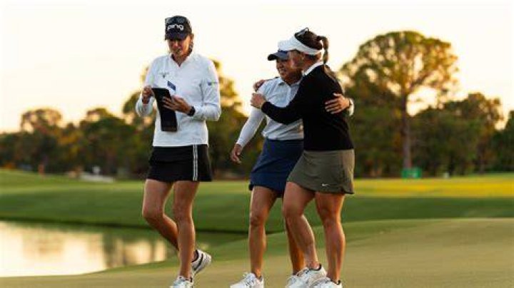 Elizabeth Szokol playing golf